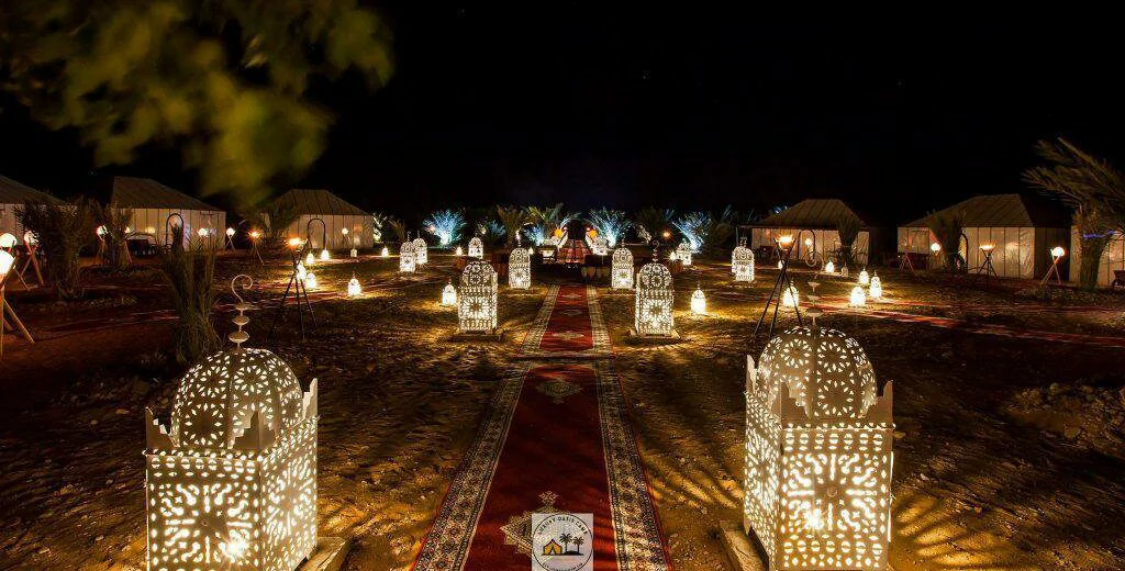 merzouga luxury desert camp at night