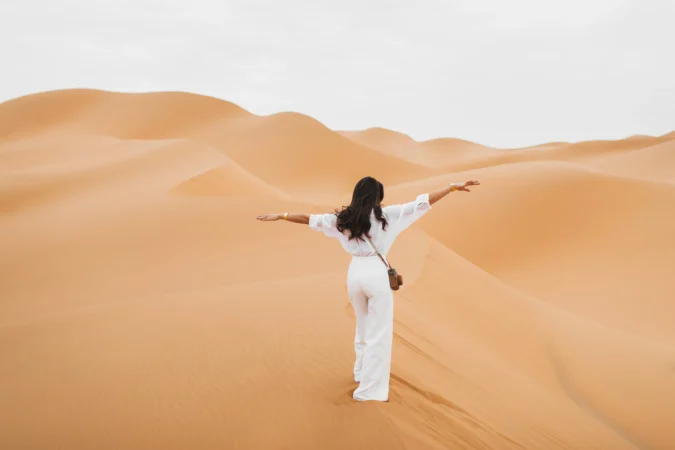 woman-in-stylish-white-shirt-and-pants-with-retro